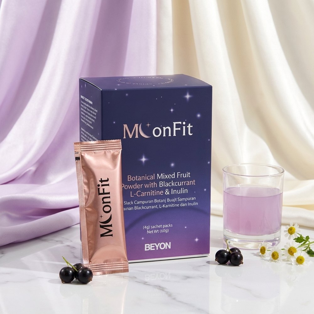 BEYON MoonFit box and rose-gold sachet on a stone plinth in warm evening light